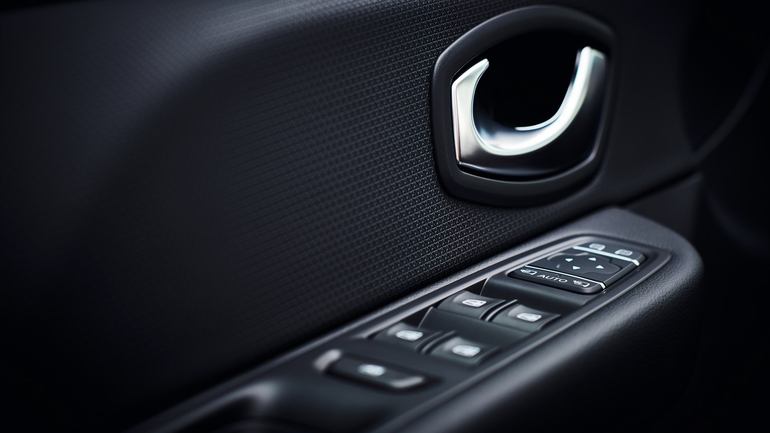 Renault CLIO - design intérieur - boutons de commande interne et poignet de porte